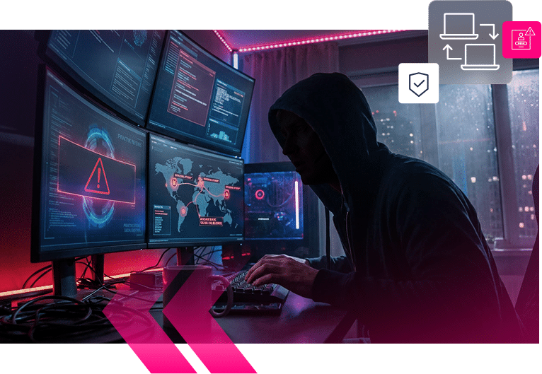 A person in a dark hoodie sits at a desk with multiple monitors displaying warning signs, maps, and code related to airlines fraud in a dimly lit room.