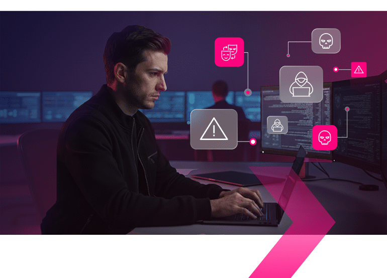 Man working at a computer with digital icons representing cybersecurity threats such as remote desktop takeover and warnings displayed alongside code on monitors.